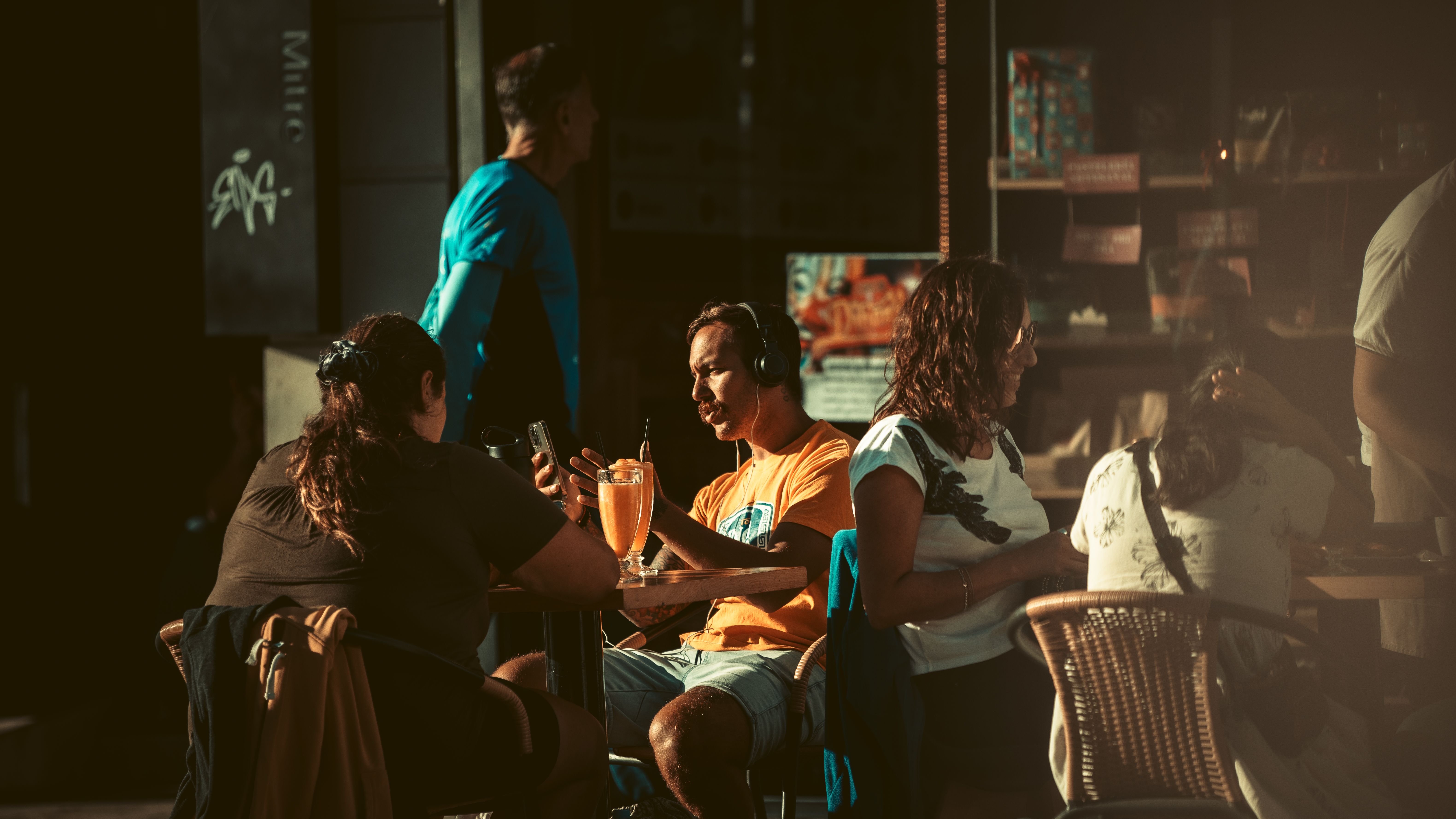Friends sharing tea at the cafe